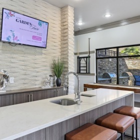 Enjoy our resident-only features event kitchen with an island and tv